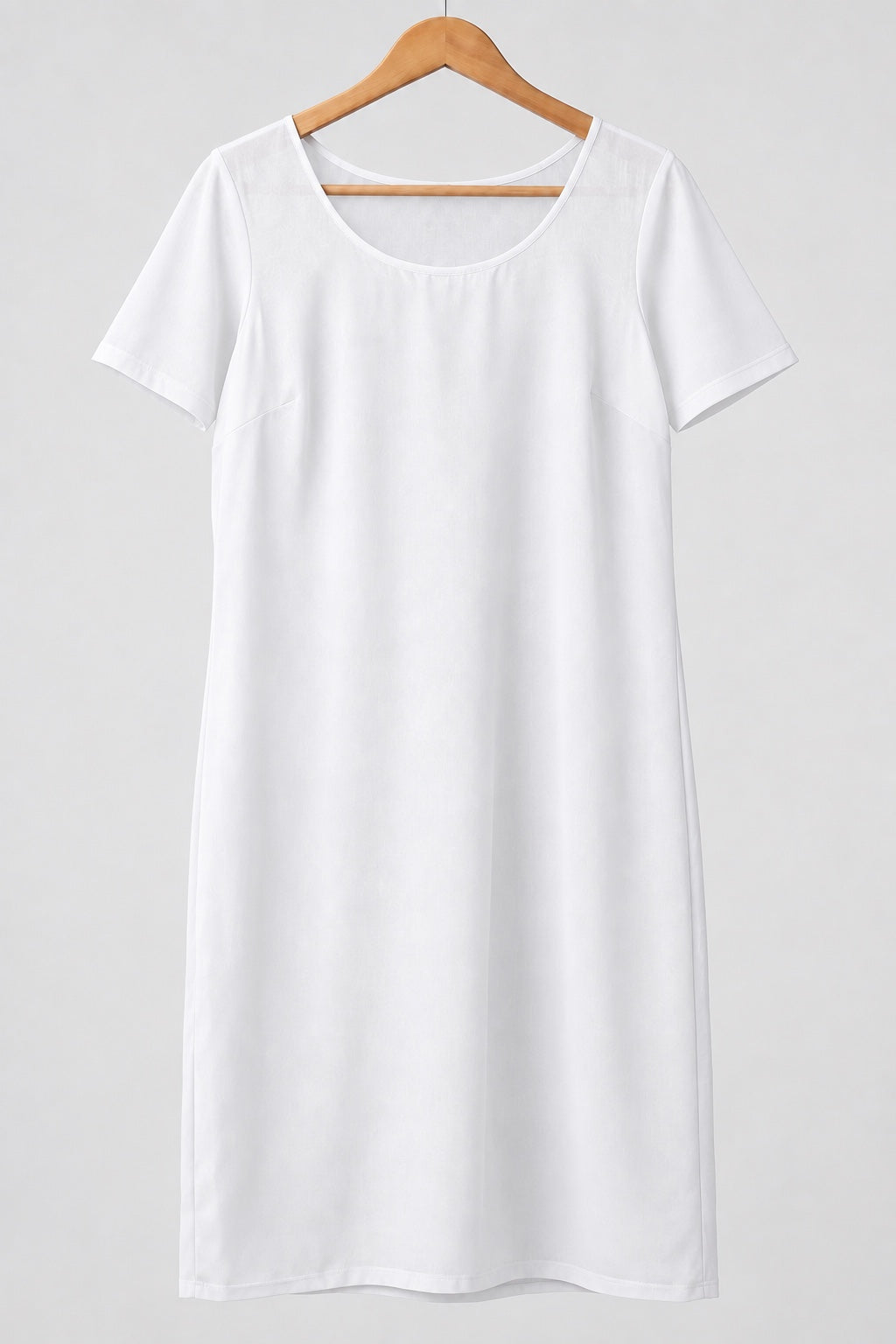 Neechy white half sleeve long cotton inner slip with a round neck on a wooden hanger