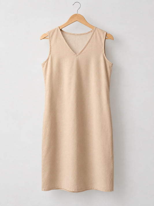 Neechy beige long cotton inner slip with a v-neck on a wooden hanger