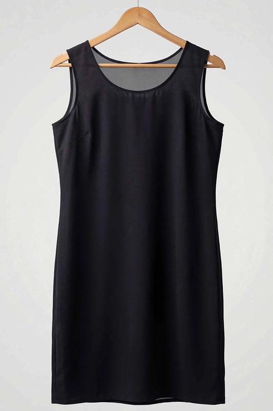 Neechy black long cotton inner slip with a round neck on a wooden hanger