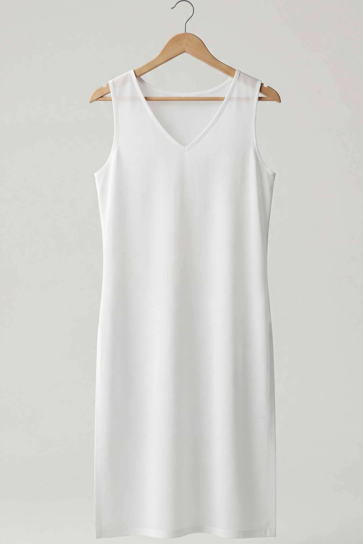 White long sleeveless slip with a V-neck