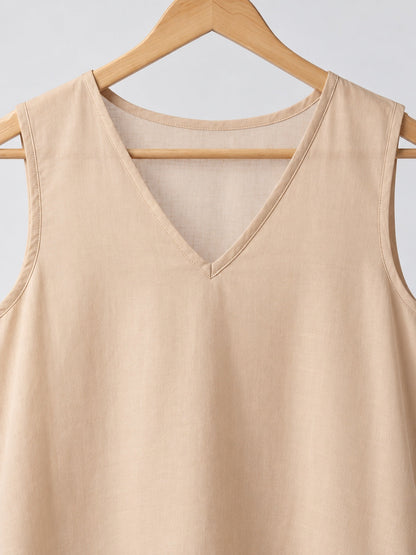 Beige sleeveless slip neckline and finished edge detail