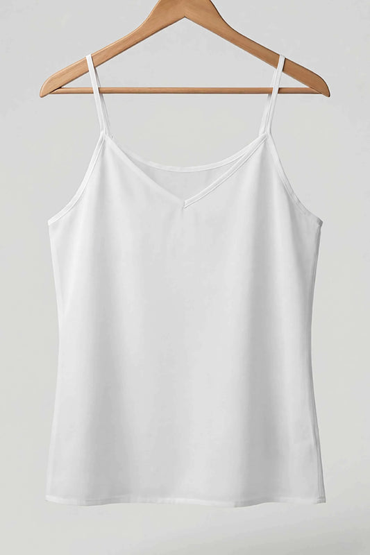 Neechy white short cotton inner slip with a v-neck on a wooden hanger